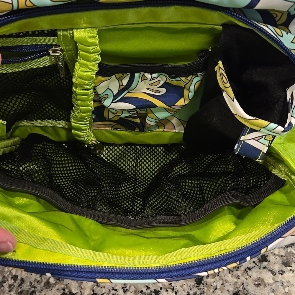 JU JU BE MESSANGER DIAPER BAG. GREEN, BLUE AND WHITE PAISLEY  AND FLORAL.